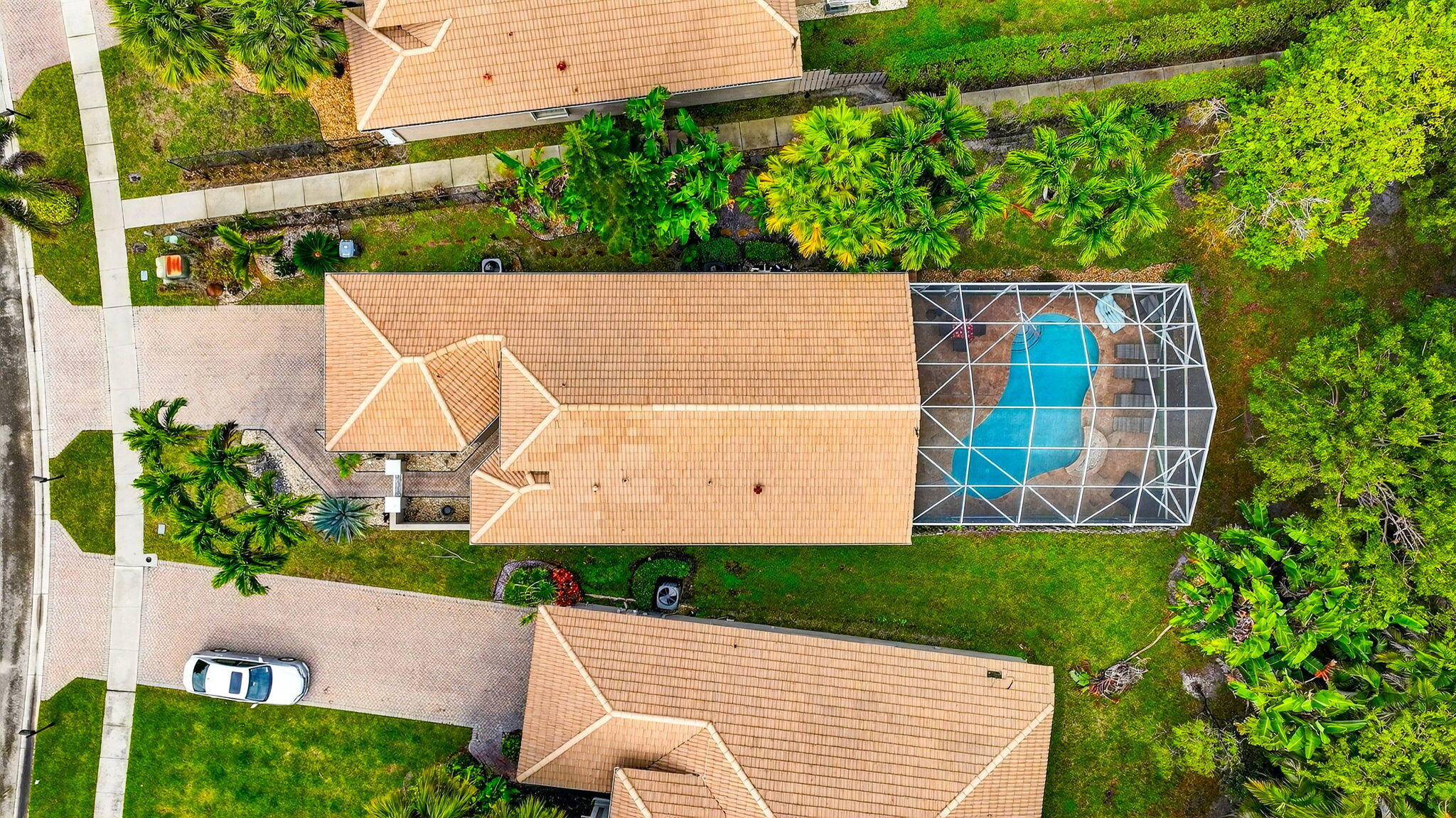 6737 Southport Drive Boynton Beach, FL 33472 - Photo 75 of 99 an aerial view of a house with a yard and potted plants