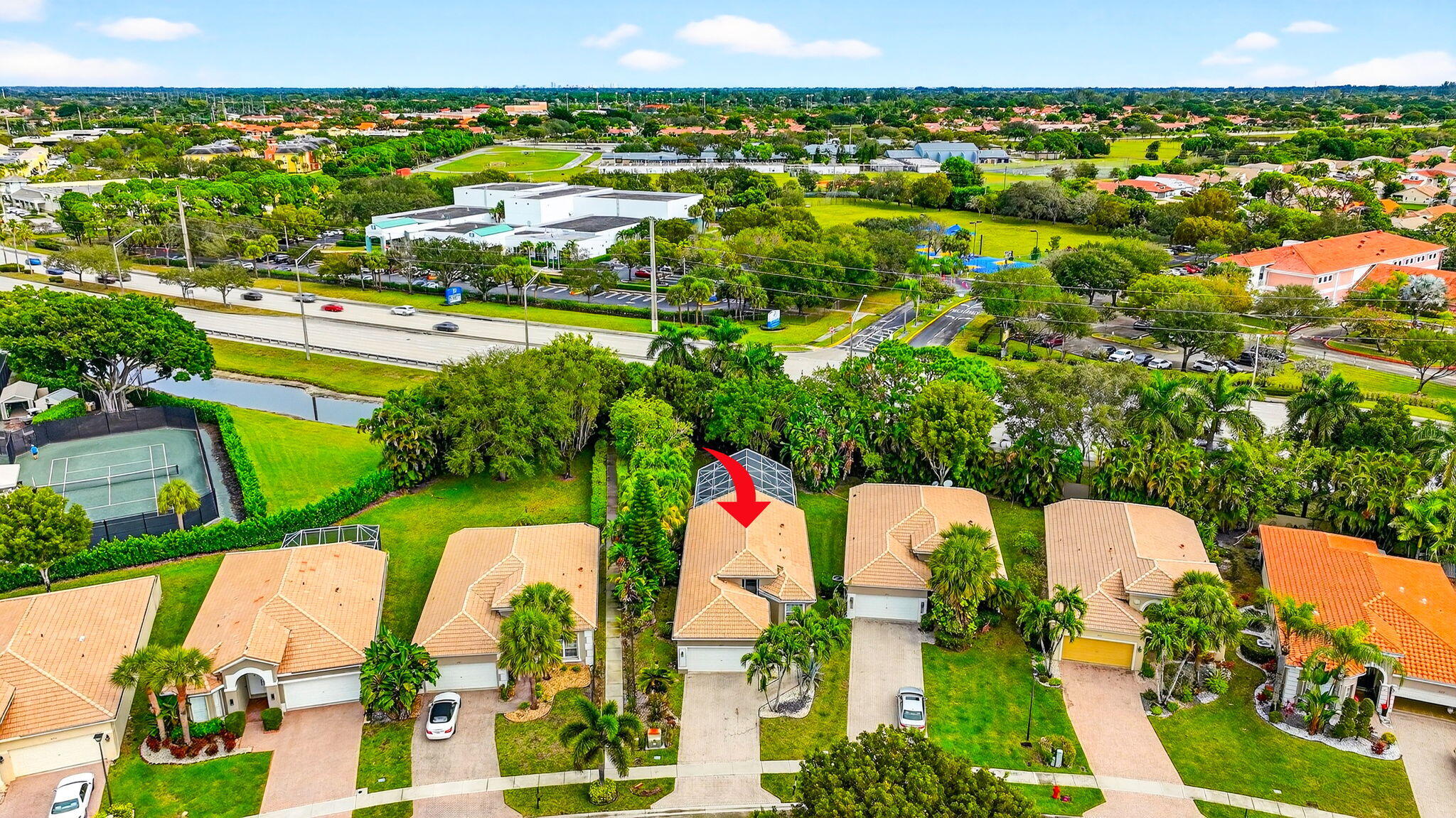 6737 Southport Drive Boynton Beach, FL 33472 - Photo 91 of 99 an aerial view of a house with a yard and lake view