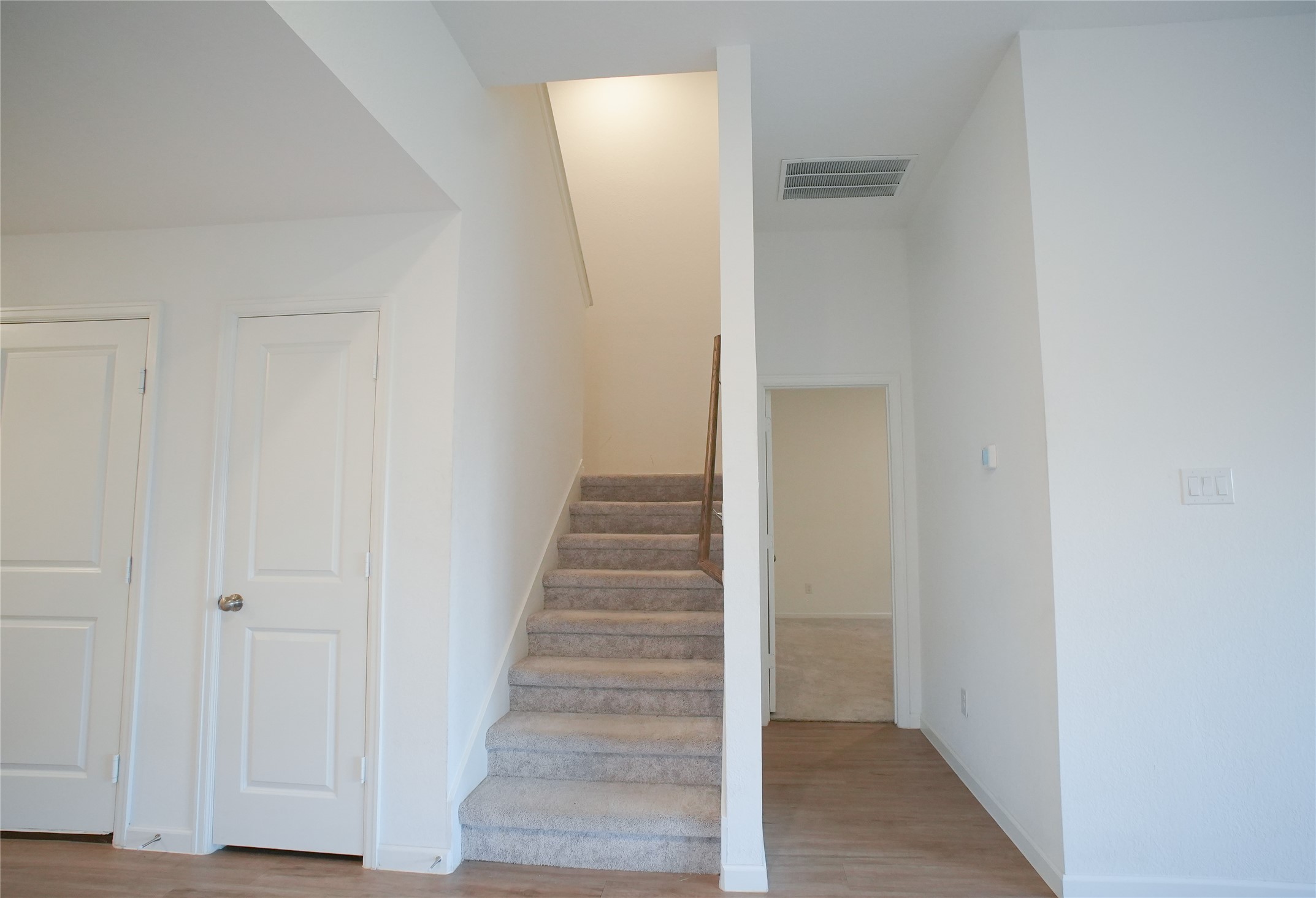 3210 Spanish Oak Lane Rosenberg, TX 77471 - Photo 16 of 29 a view of a hallway with wooden floor and entryway