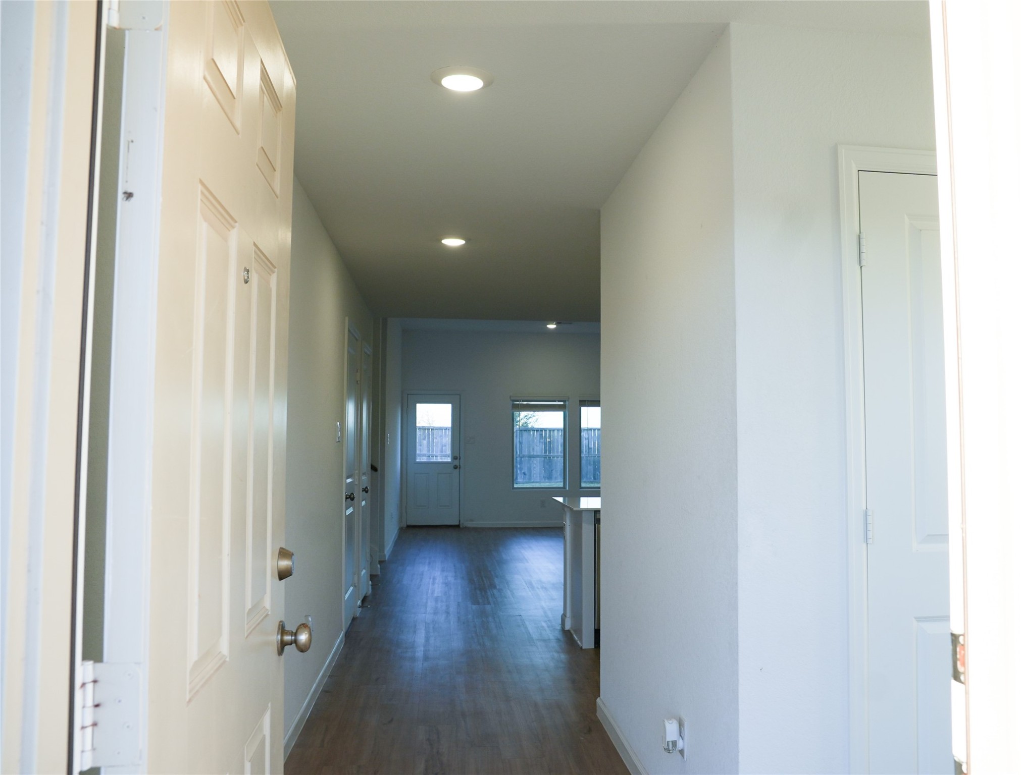 3210 Spanish Oak Lane Rosenberg, TX 77471 - Photo 2 of 29 a view of hallway with livingroom and wooden floor