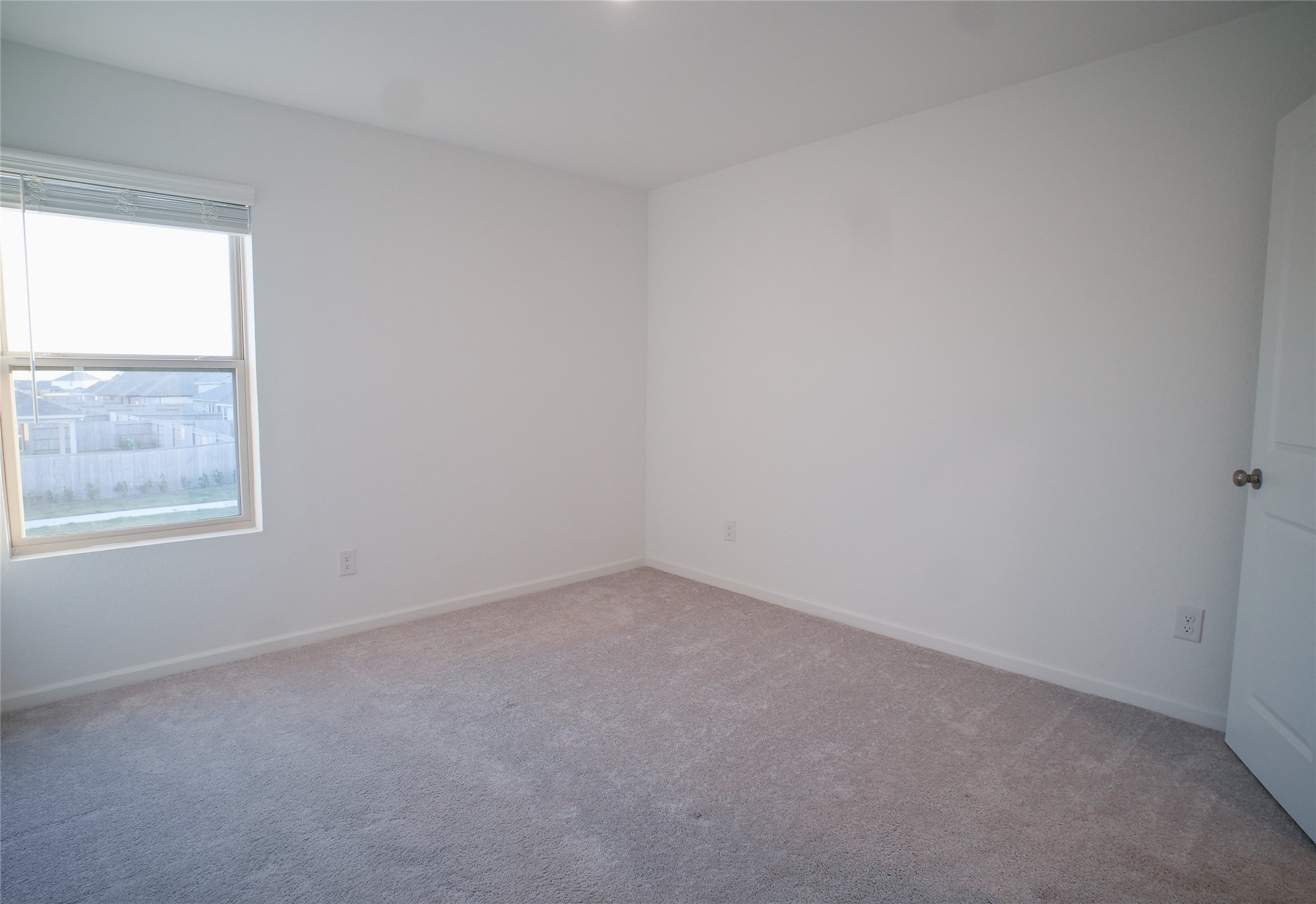 3210 Spanish Oak Lane Rosenberg, TX 77471 - Photo 28 of 29 an empty room with a window