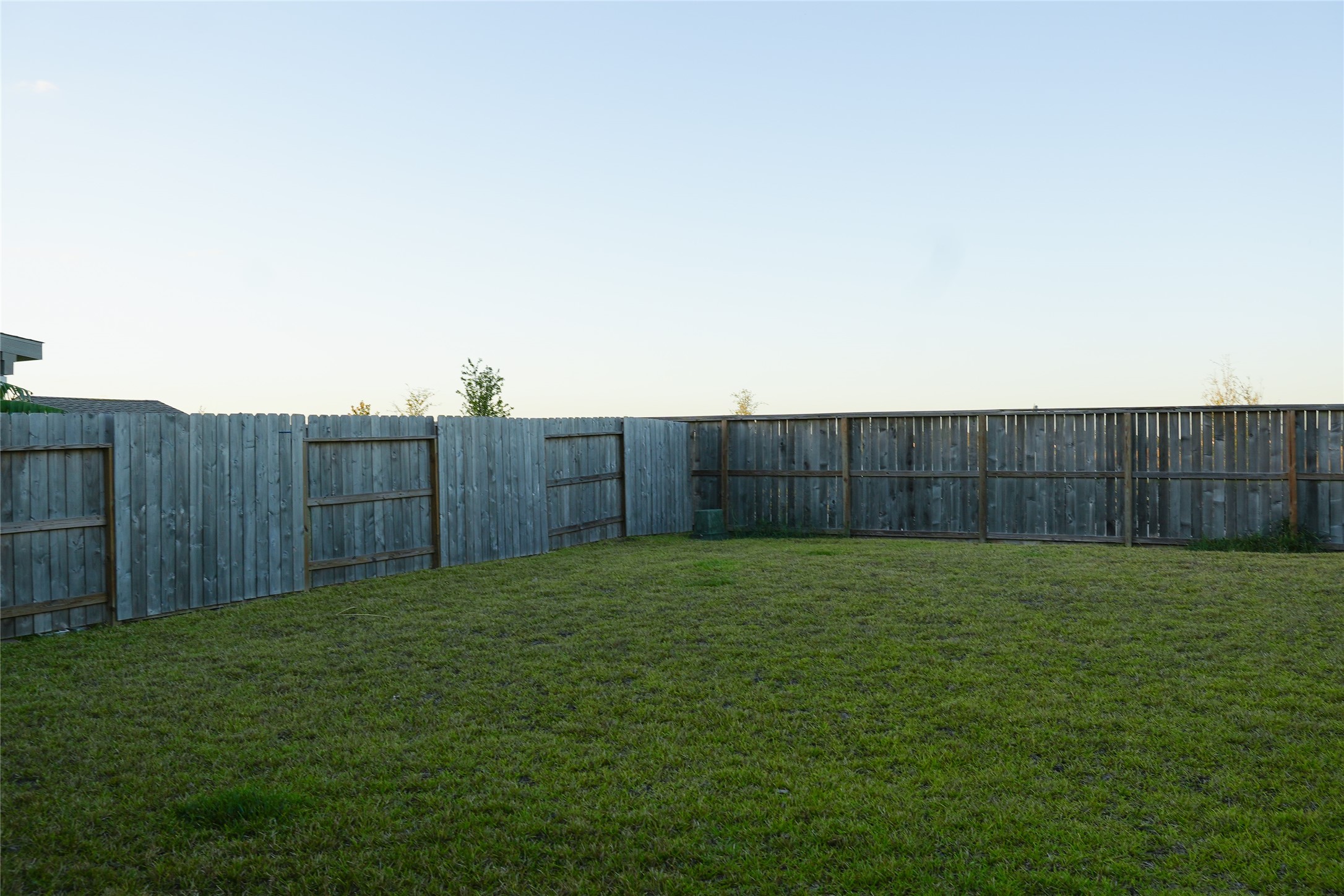 3210 Spanish Oak Lane Rosenberg, TX 77471 - Photo 29 of 29 a view of a backyard with wooden fence