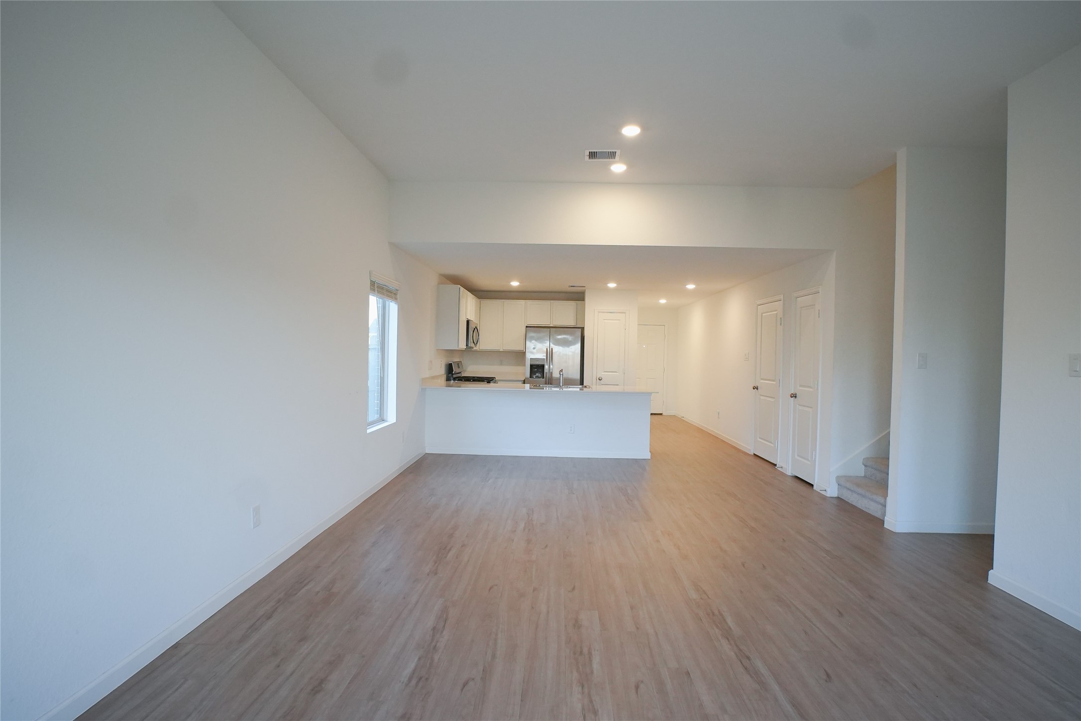 3210 Spanish Oak Lane Rosenberg, TX 77471 - Photo 7 of 29 a view of a kitchen with wooden floor