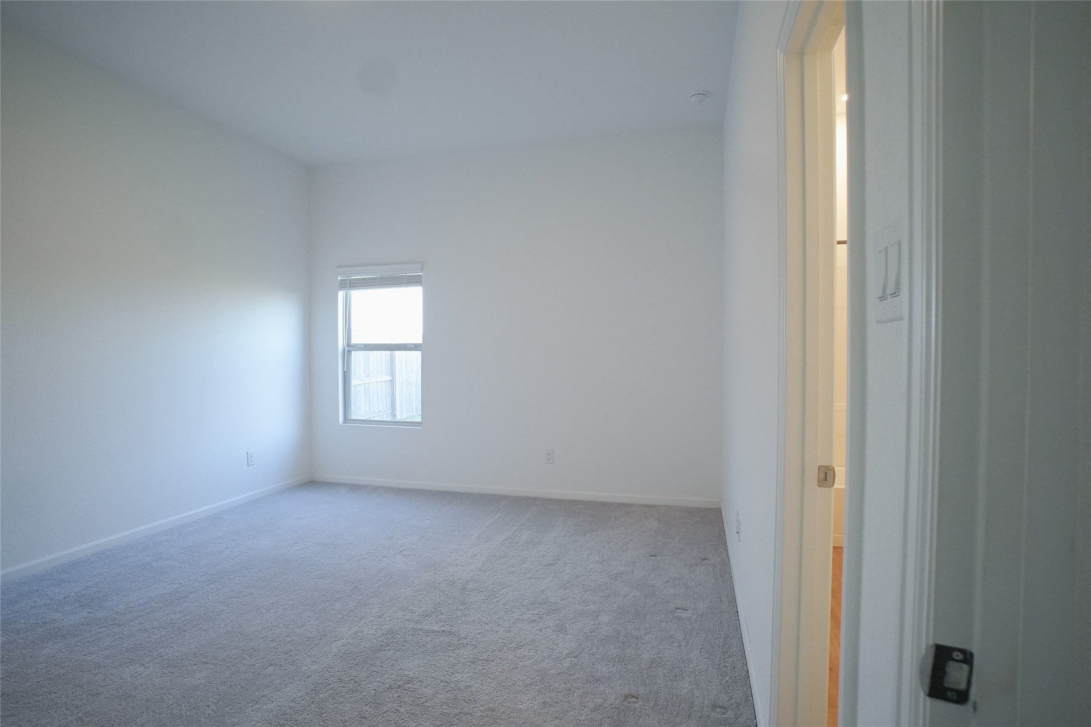 3210 Spanish Oak Lane Rosenberg, TX 77471 - Photo 10 of 29 an empty room with a window