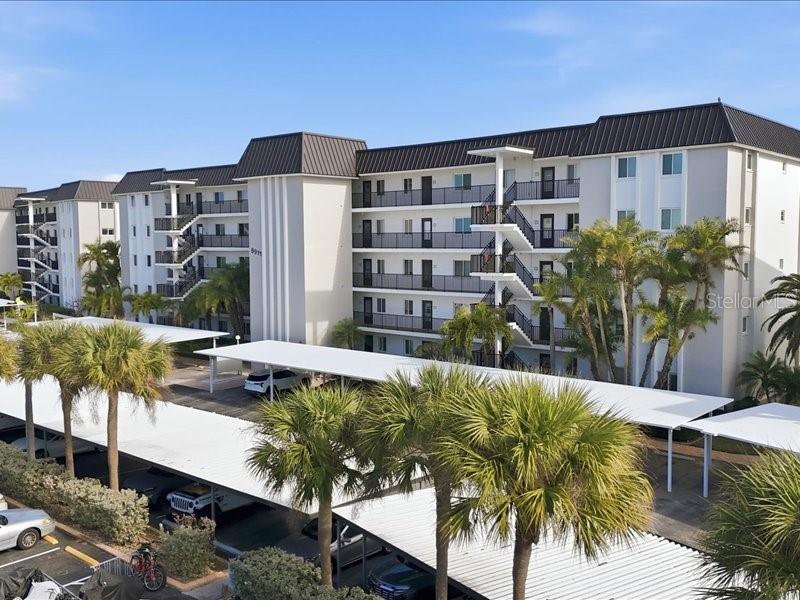 8911 Midnight Pass Road, Unit 208 Sarasota, FL 34242 - Photo 3 of 46 a house view with a outdoor space