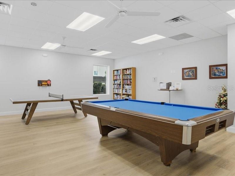 8911 Midnight Pass Road, Unit 208 Sarasota, FL 34242 - Photo 32 of 46 a room with furniture pool table and windows