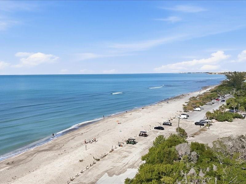 8911 Midnight Pass Road, Unit 208 Sarasota, FL 34242 - Photo 42 of 46 a view of an ocean beach
