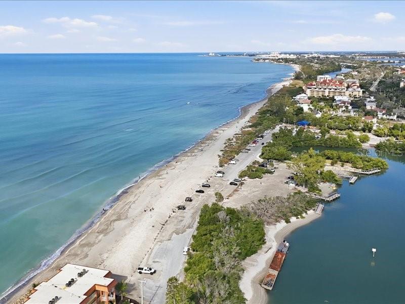 8911 Midnight Pass Road, Unit 208 Sarasota, FL 34242 - Photo 43 of 46 an aerial view of beach and ocean