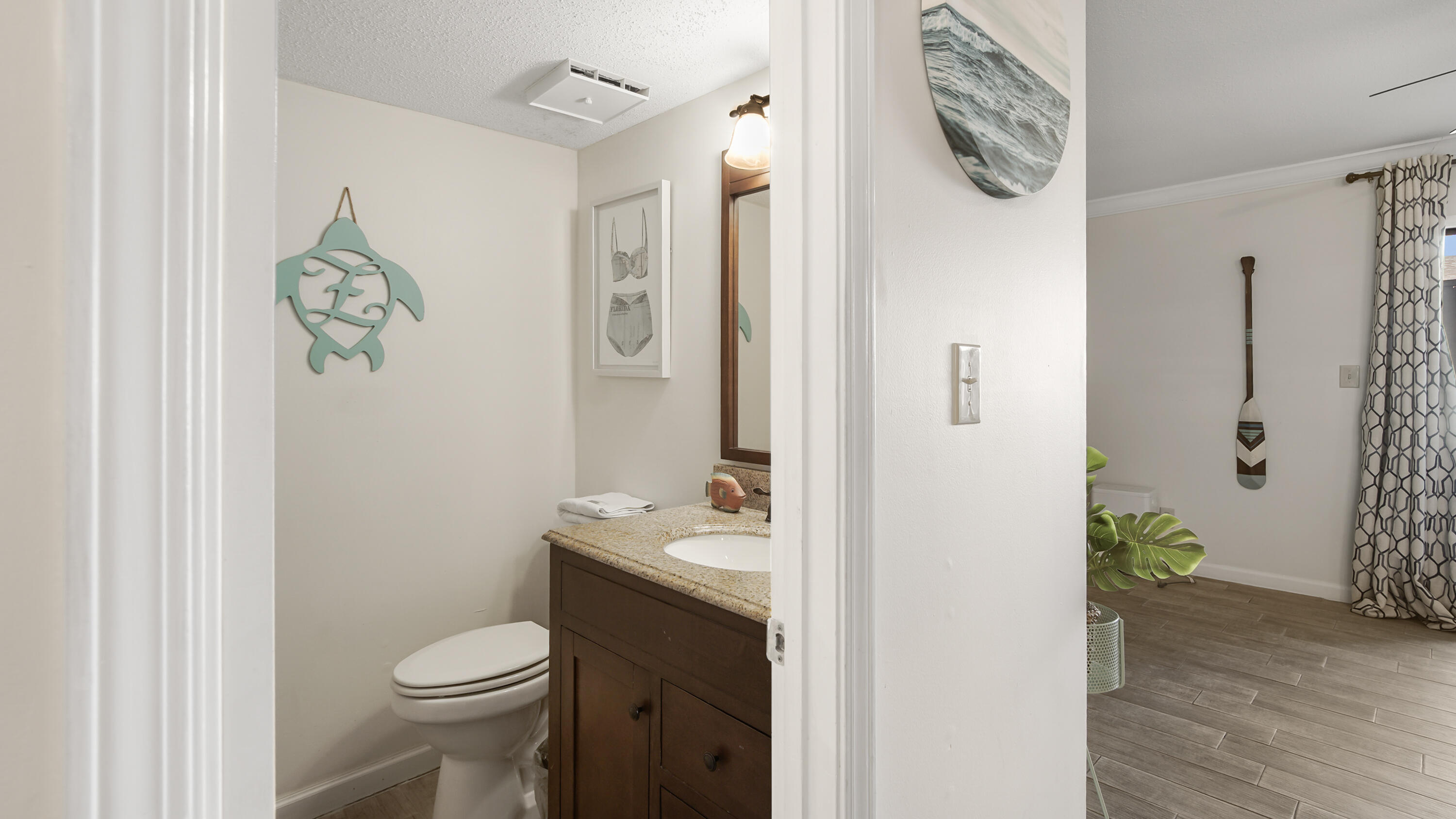 25 Misty Cove, Unit 116 Miramar Beach, FL 32550 - Photo 12 of 52 a bathroom with a sink a toilet and shower