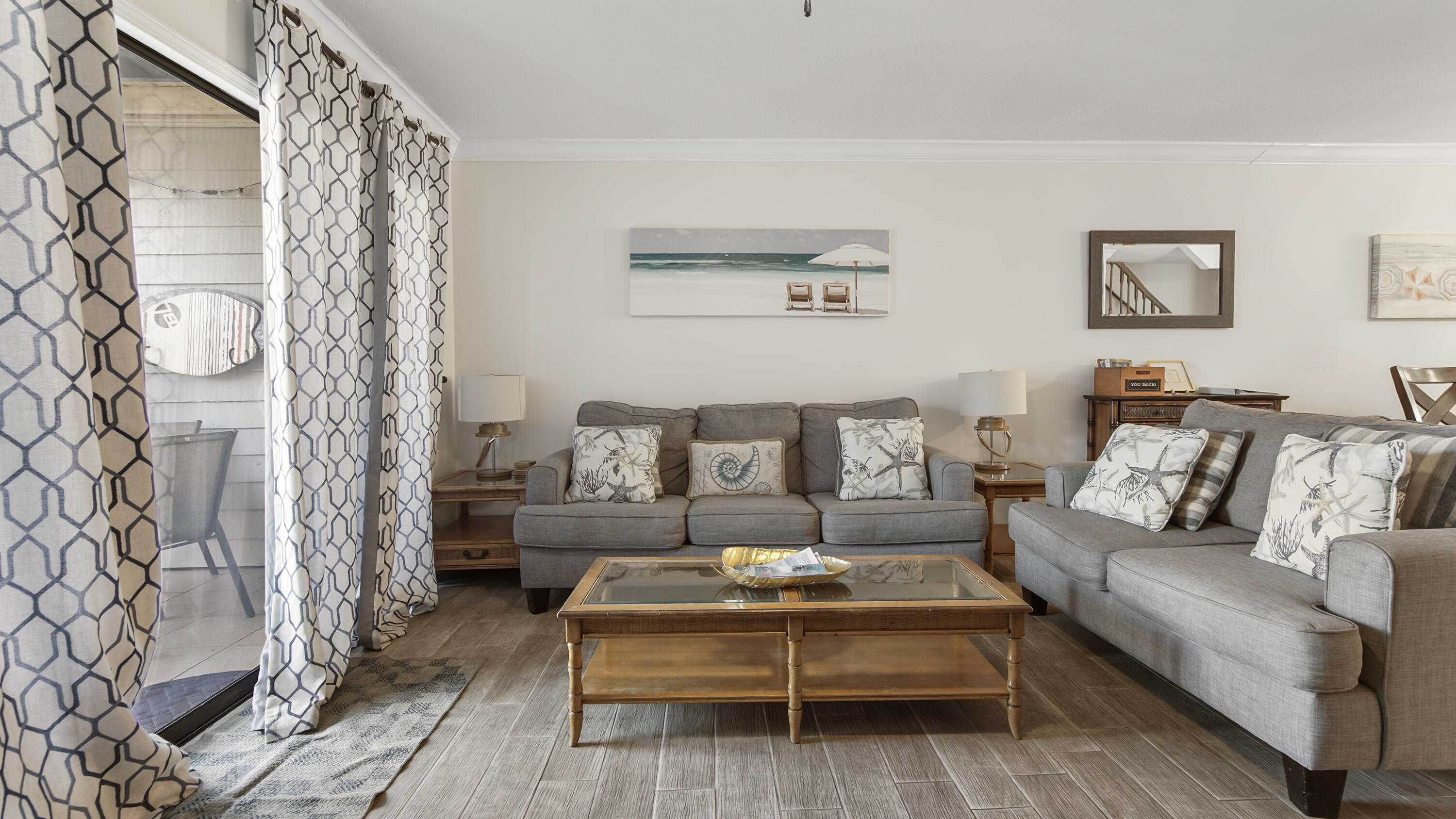 25 Misty Cove, Unit 116 Miramar Beach, FL 32550 - Photo 17 of 52 a living room with furniture and a rug