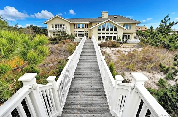 a kitchen with kitchen island granite countertop a table and chairs