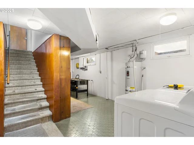 a bathroom with a sink and a shower