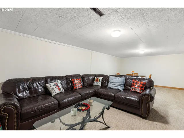 a living room with furniture and a couch