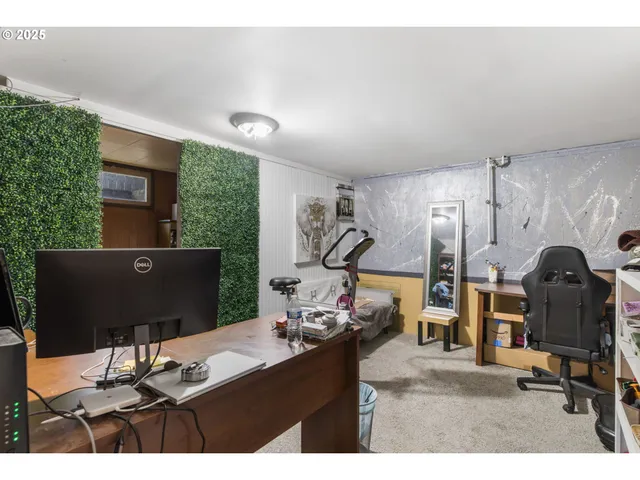 a view of a workspace with furniture