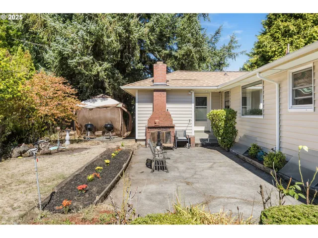 a view of a patio in backyard