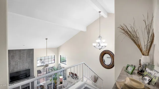 a view of a hallway with seating area