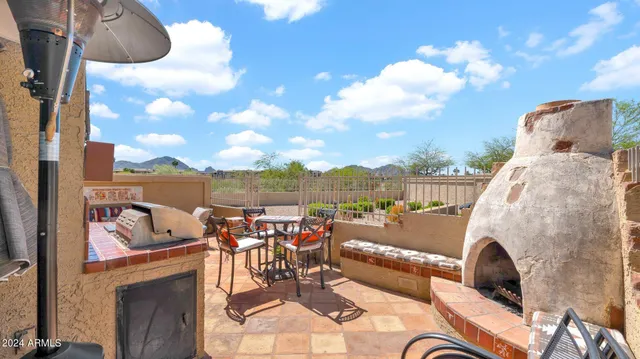 a view of a terrace with furniture