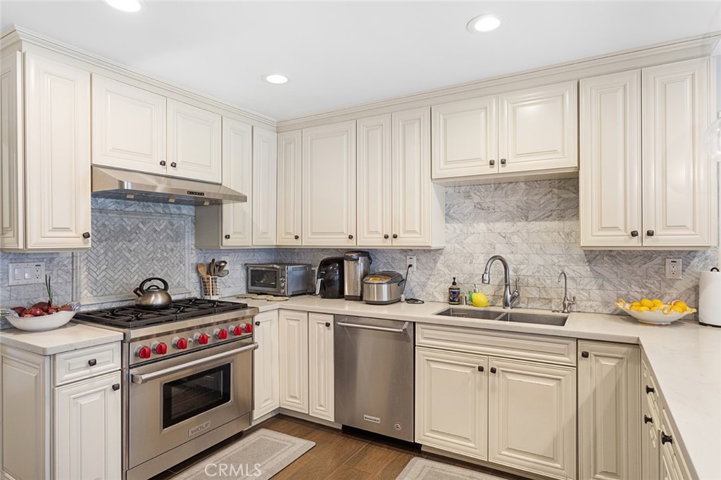 1626 Rodeo Road Arcadia, CA 91006 - Photo 11 of 28 a kitchen with cabinets appliances a sink and a cabinets