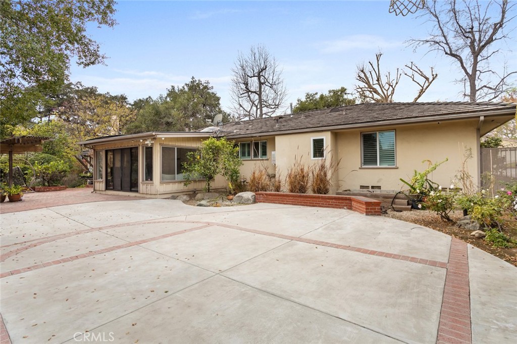 1626 Rodeo Road Arcadia, CA 91006 - Photo 24 of 28 a front view of house with yard outdoor seating and barbeque oven