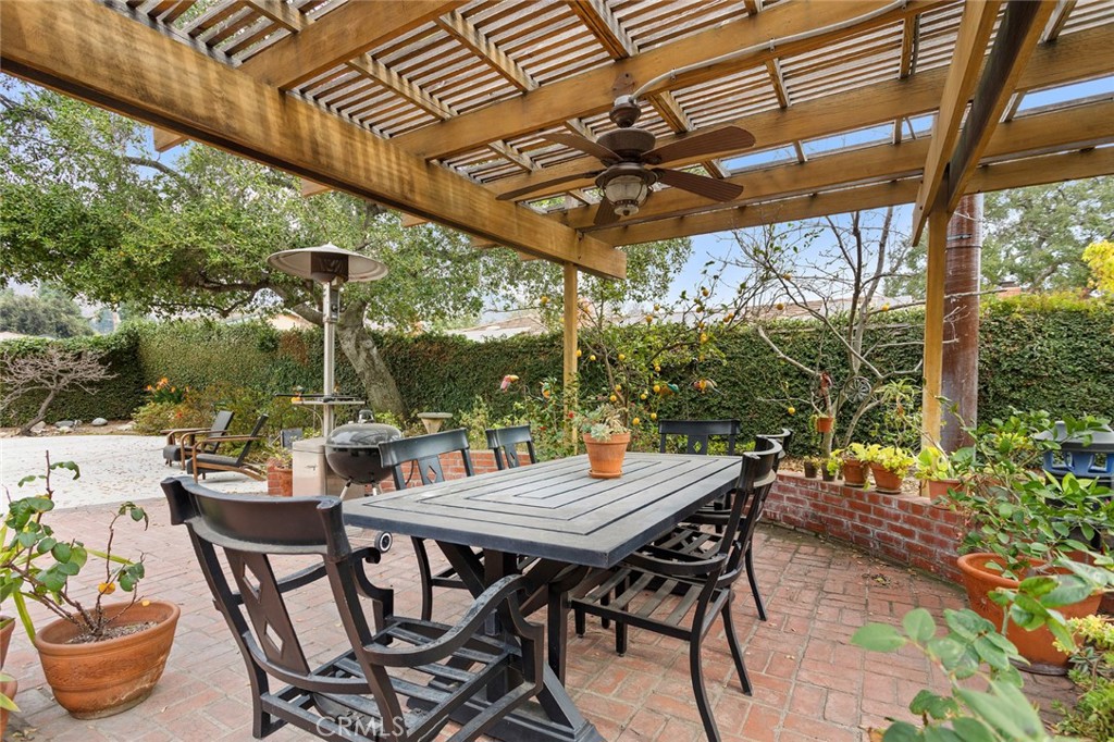1626 Rodeo Road Arcadia, CA 91006 - Photo 26 of 28 a view of patio with table and chairs and potted plants