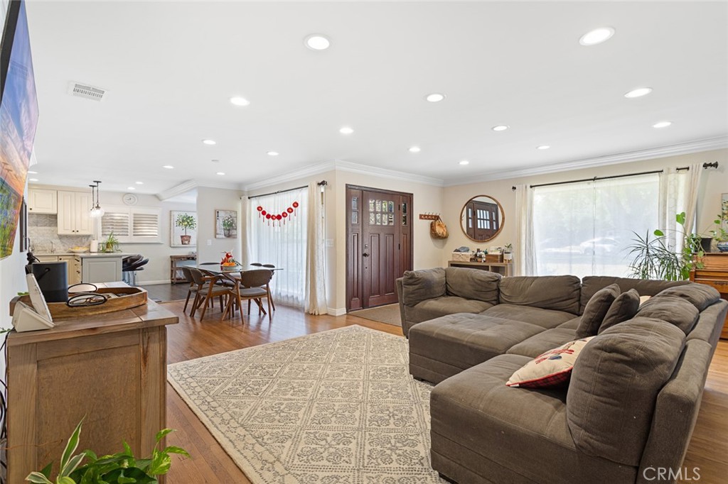 1626 Rodeo Road Arcadia, CA 91006 - Photo 6 of 28 a living room with furniture and a dining table
