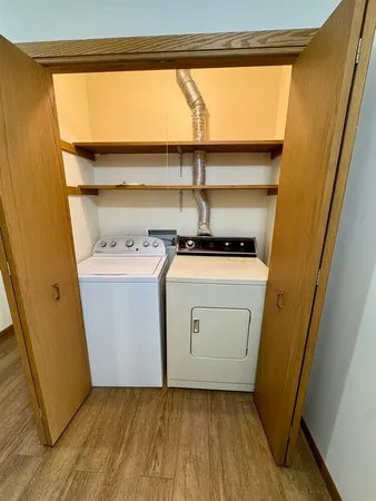 a utility room with washer and dryer
