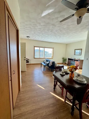 a view of a livingroom with furniture and a rug