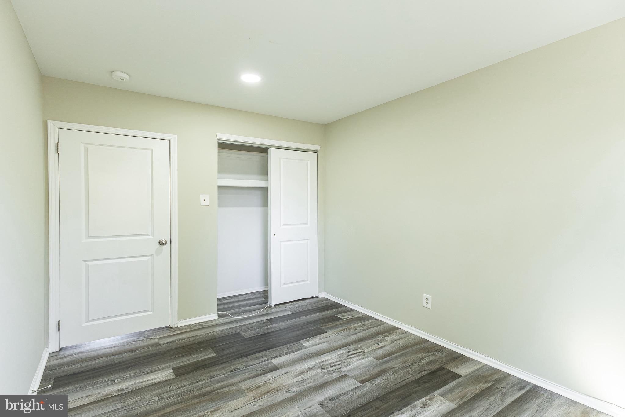 9463 Ashton Road, Unit 1 Philadelphia, PA 19114 - Photo 13 of 25 a view of a room with wooden floor and entryway