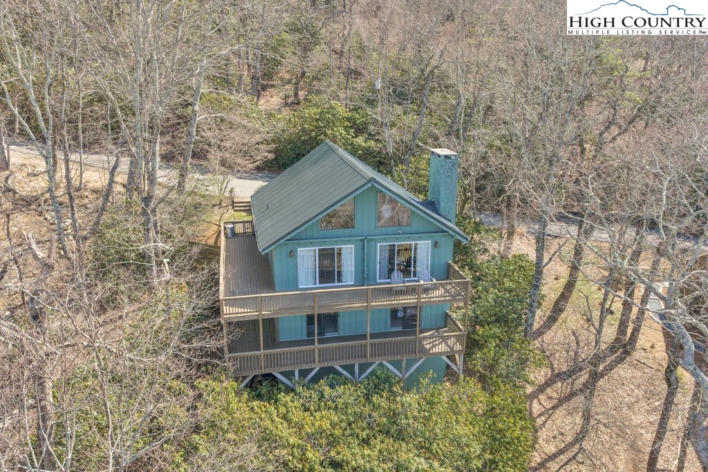 198 Laurel Hill Lane Boone, NC 28607 - Photo 11 of 50 a house with tall trees