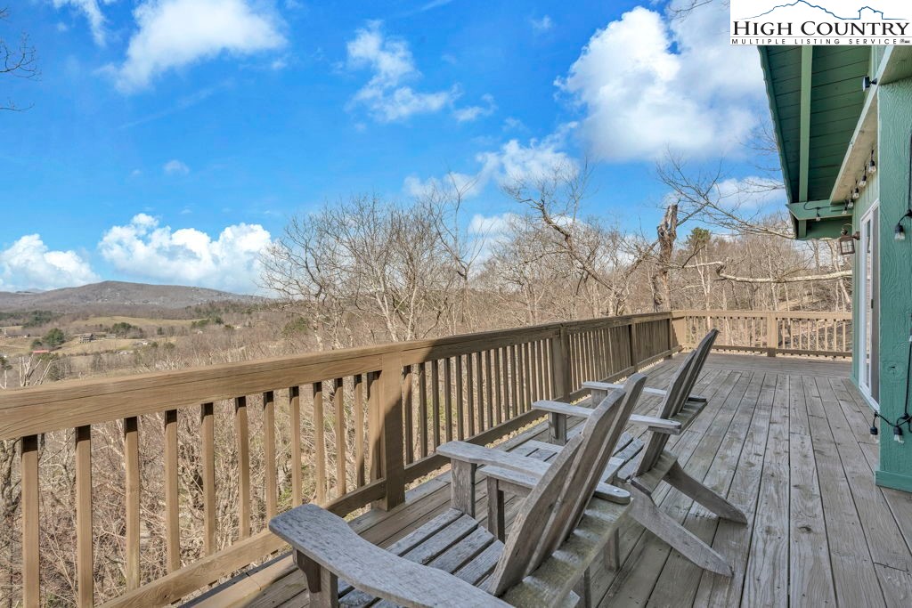 198 Laurel Hill Lane Boone, NC 28607 - Photo 15 of 50 a view of a balcony with wooden floor and fence