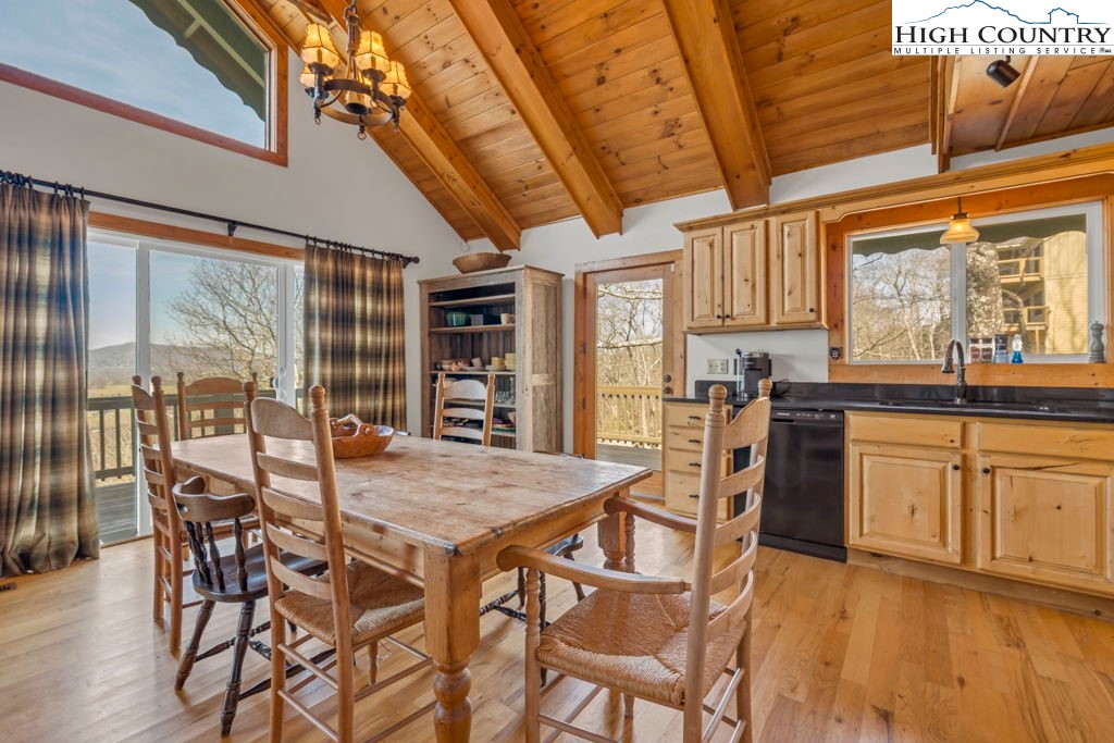 198 Laurel Hill Lane Boone, NC 28607 - Photo 26 of 50 a view of a dining room with furniture and window