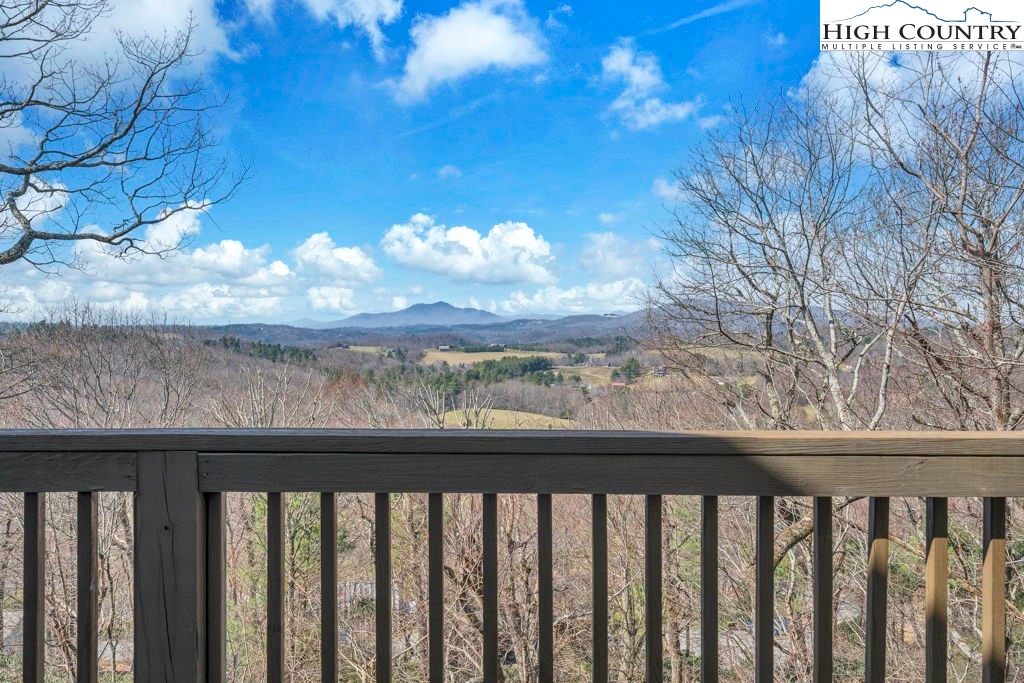 198 Laurel Hill Lane Boone, NC 28607 - Photo 3 of 50 a view of a balcony with wooden fence