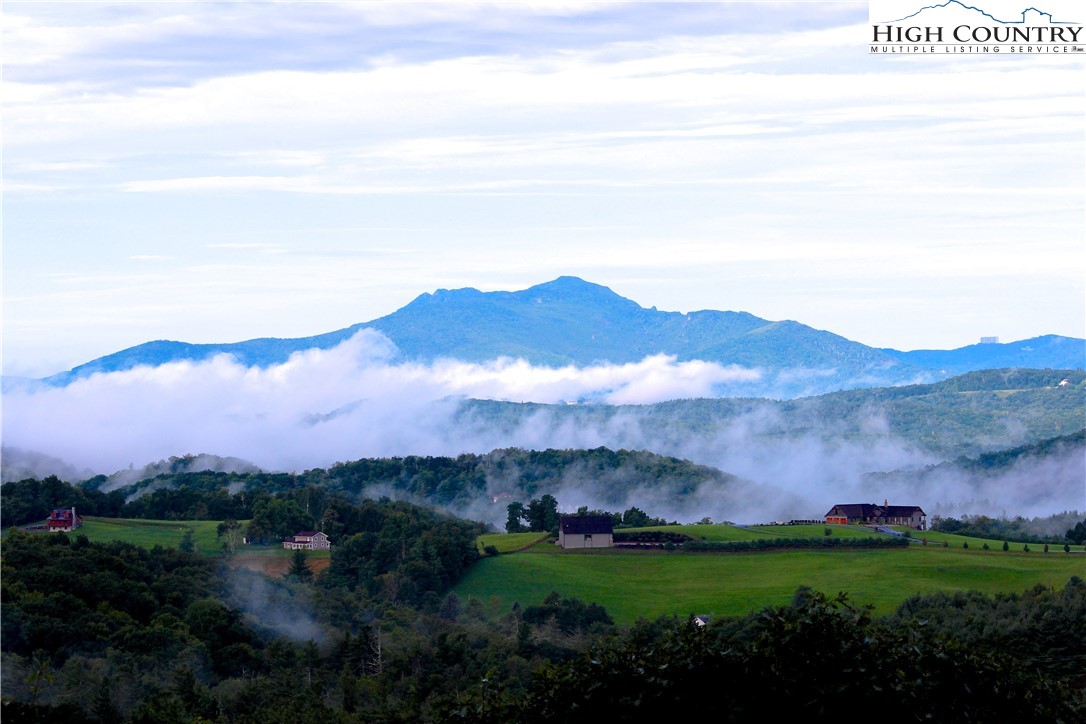 198 Laurel Hill Lane Boone, NC 28607 - Photo 5 of 50 a view of a lush green hillside and houses