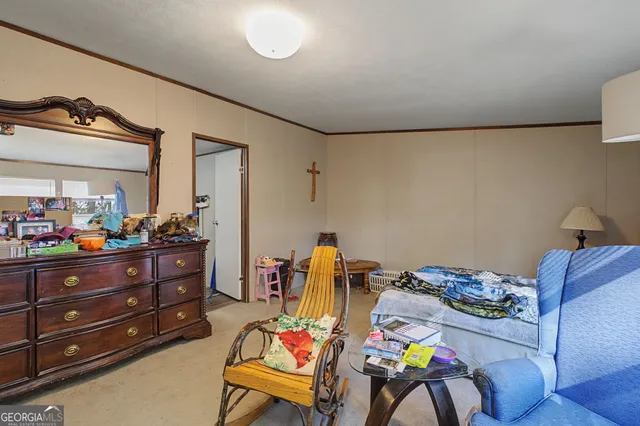 a room with furniture and musical instruments