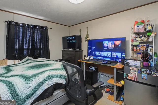 a bed room with a bed and a furniture