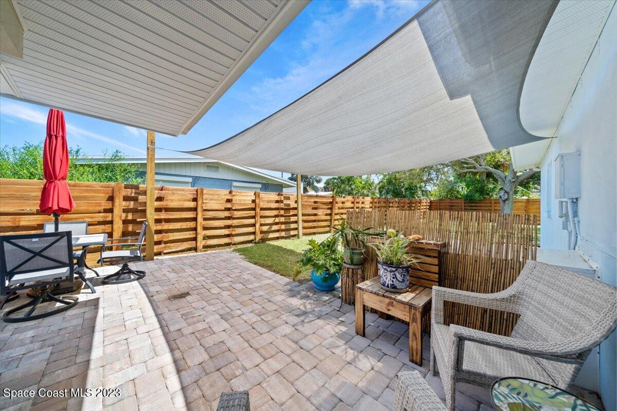 550 Capri Road Cocoa Beach, FL 32931 - Photo 27 of 36 a garden view with a seating space