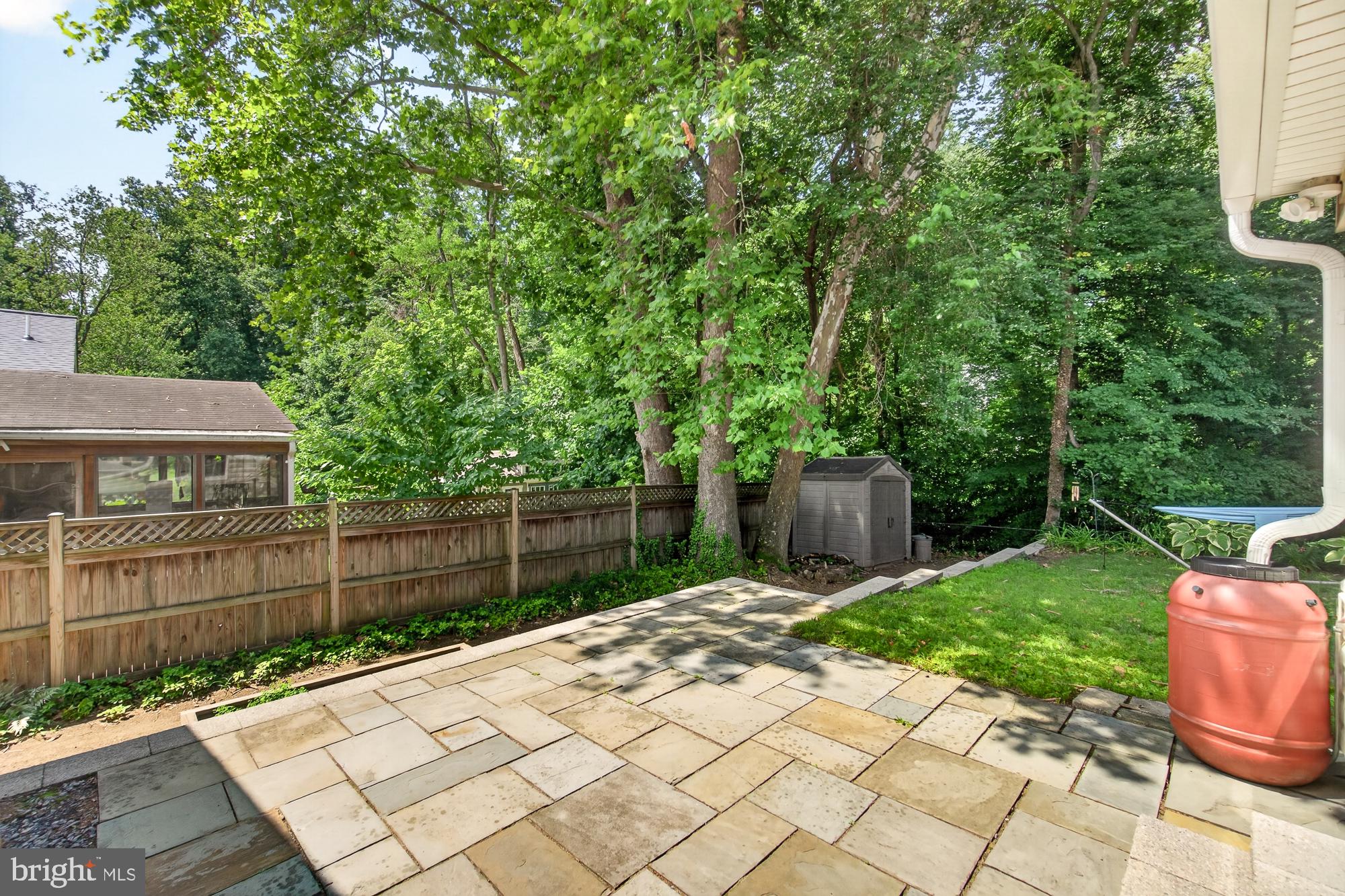 10202 Leslie Street Silver Spring, MD 20910 - Photo 43 of 44 Serene backyard oasis with lush greenery.