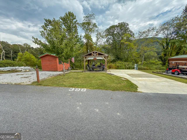 a front view of a house with yard