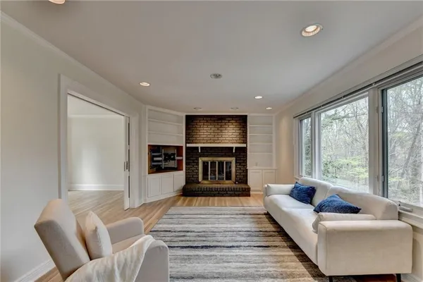 a kitchen with stainless steel appliances granite countertop a sink and refrigerator