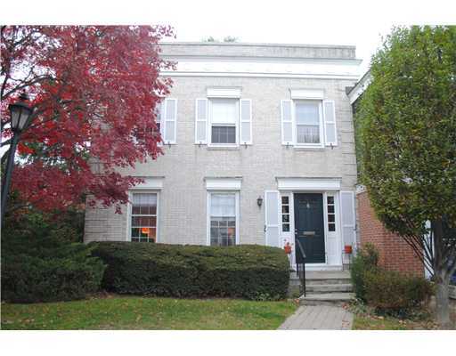 155 Field Point Road, Unit 1N Greenwich, CT 06830 - Photo 1 of 7 a view front of house with yard and green space