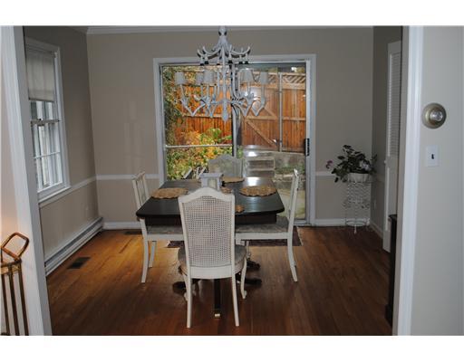 155 Field Point Road, Unit 1N Greenwich, CT 06830 - Photo 4 of 7 a view of a dining room with furniture window and wooden floor