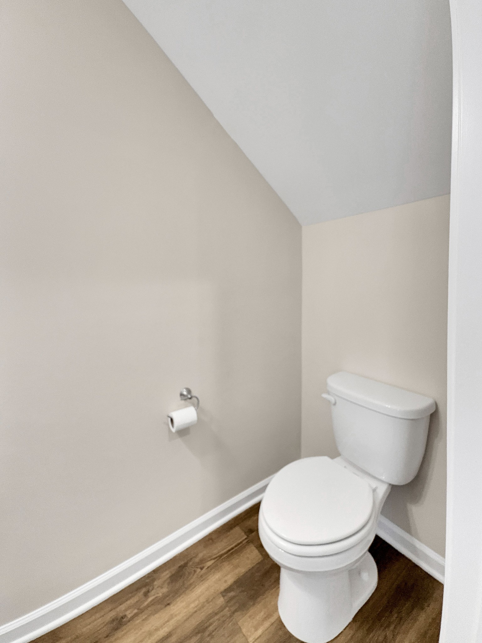 147 Addi Street Pleasant View, TN 37146 - Photo 11 of 26 a white toilet sitting next to a shower
