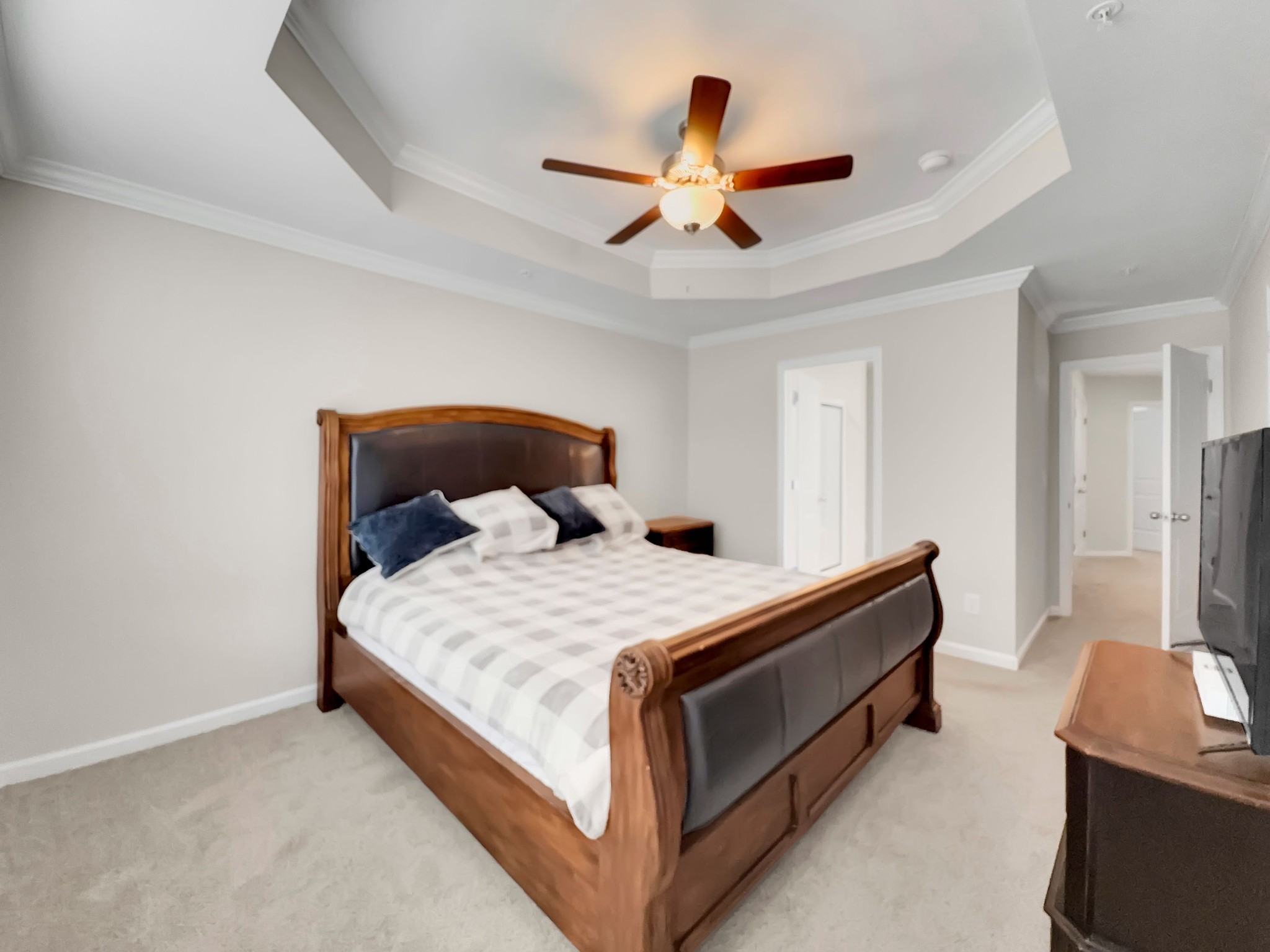 147 Addi Street Pleasant View, TN 37146 - Photo 13 of 26 a bed room with a bed and a ceiling fan