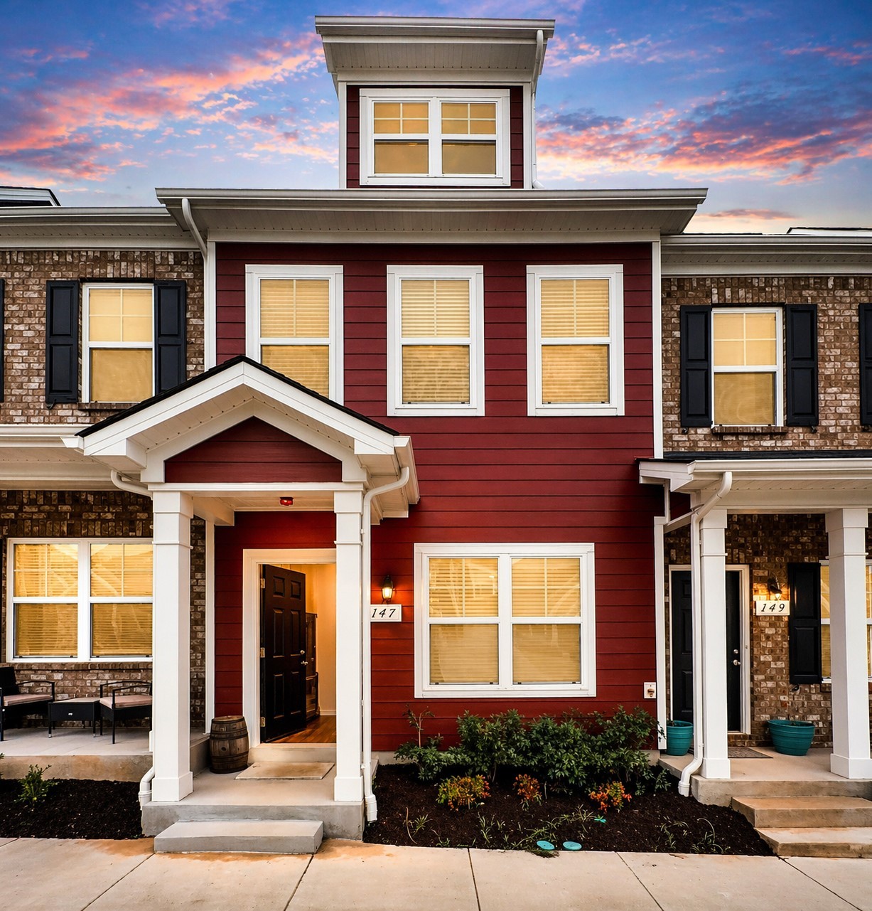 147 Addi Street Pleasant View, TN 37146 - Photo 2 of 26 front view of a brick house with a yard
