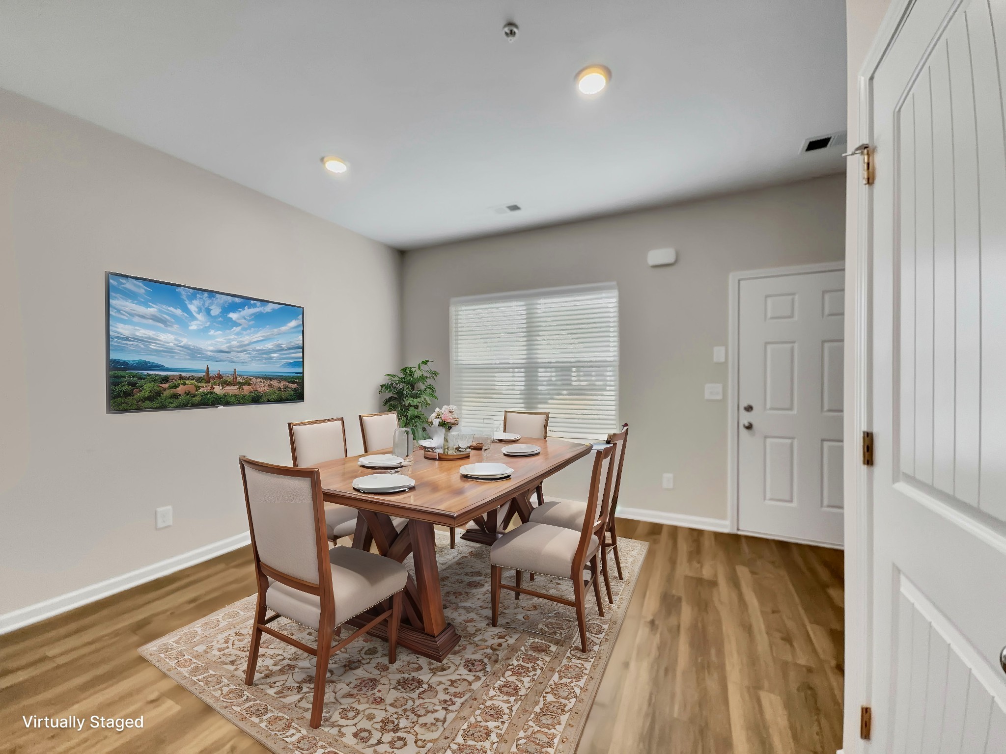 147 Addi Street Pleasant View, TN 37146 - Photo 3 of 26 a view of a dining room with furniture and wooden floor