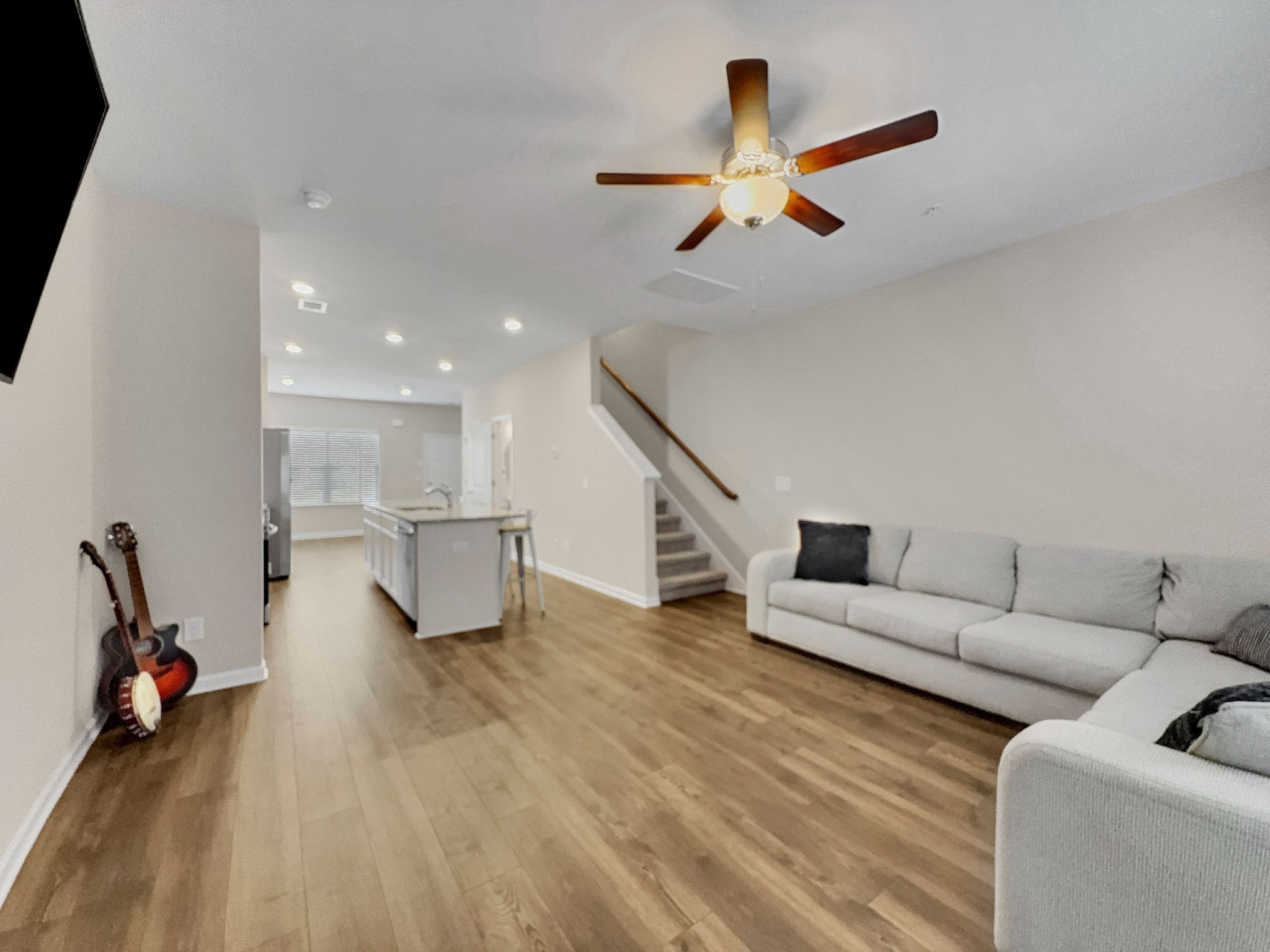 147 Addi Street Pleasant View, TN 37146 - Photo 9 of 26 a living room with furniture and a ceiling fan