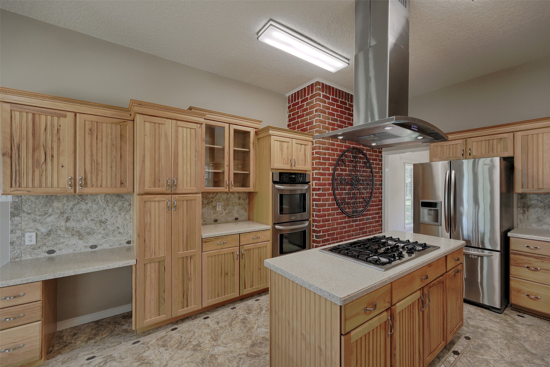 2 Highland Drive Huntsville, TX 77320 - Photo 18 of 50 a kitchen with granite countertop a sink stainless steel appliances and cabinets