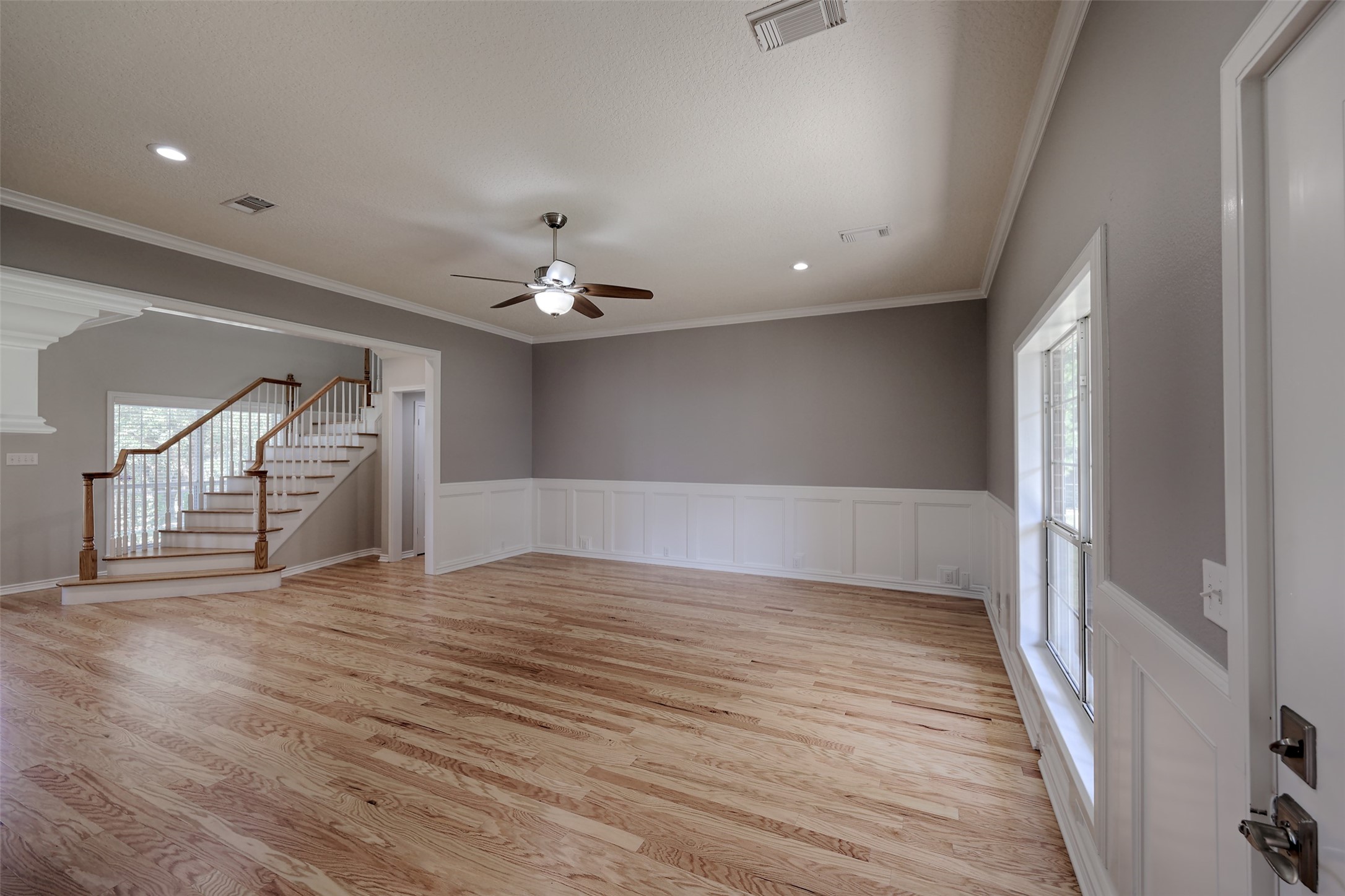 2 Highland Drive Huntsville, TX 77320 - Photo 23 of 50 wooden floor in an empty room with a window