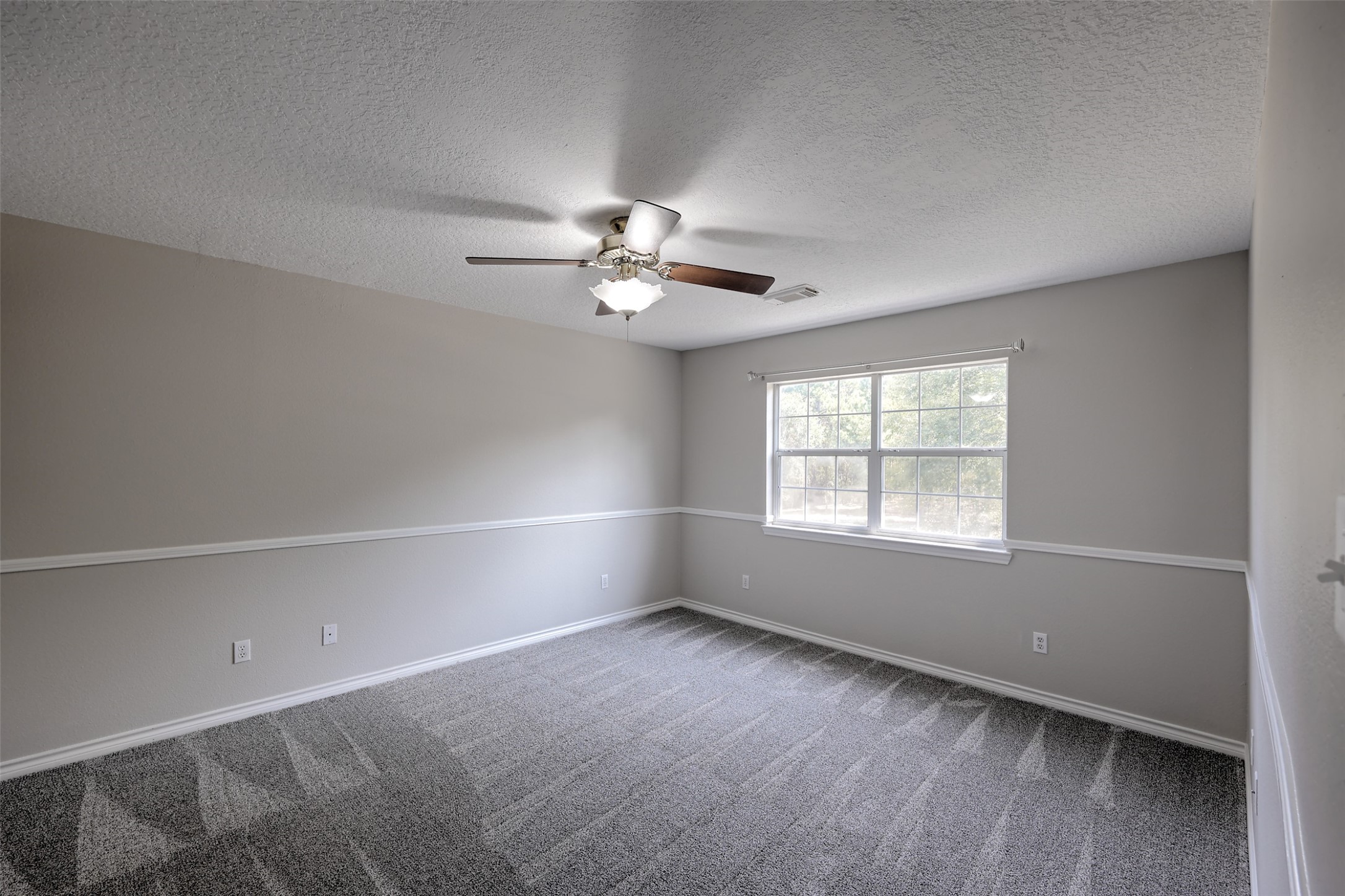 2 Highland Drive Huntsville, TX 77320 - Photo 34 of 50 wooden floor in an empty room with a window