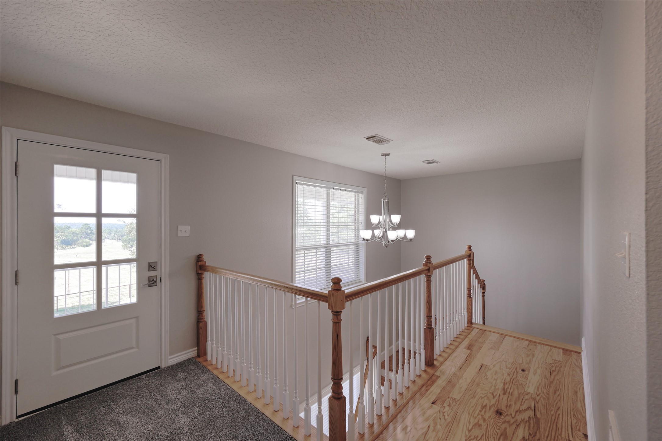2 Highland Drive Huntsville, TX 77320 - Photo 35 of 50 a view of a hallway view with staircase
